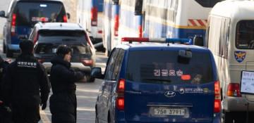 South Korean court sentences four for assaulting reporters