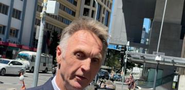 Fraud charges dropped against Australian Olympic swimmer Neil Brooks