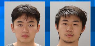 How did two men allegedly try to fraudulently purchase a Tesla at a Knoxville dealership?