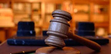 Russian court sentences first woman for military absence case