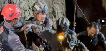 First of five men found alive in flooded Laos cave rescued  (World)