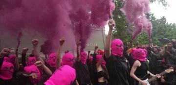 Pussy Riot storms Russian pavilion at Venice Biennale with smoke protest over Ukraine war