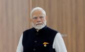 Modi urges Indians to cut fuel use, avoid gold purchases
