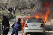 Israeli settlers set fire to mosque and cars in West Bank raids