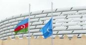 WUF13: Flags of the United Nations and the Republic of Azerbaijan raised