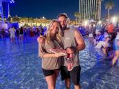 Tucker Wetmore signs fan's shoe with eyeliner at wild ACM Beach Bash
