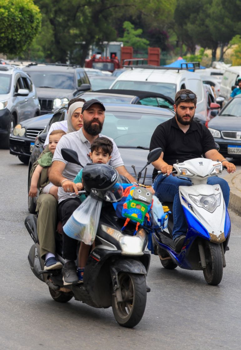 News about -  In Photos:  People flee southern Beirut after Israel's Netanyahu order strikes