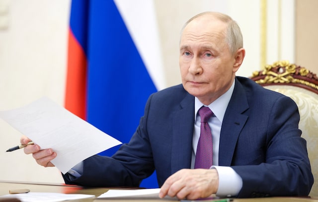 Putin faces rival visions of war and peace at Russia's 'Davos' 