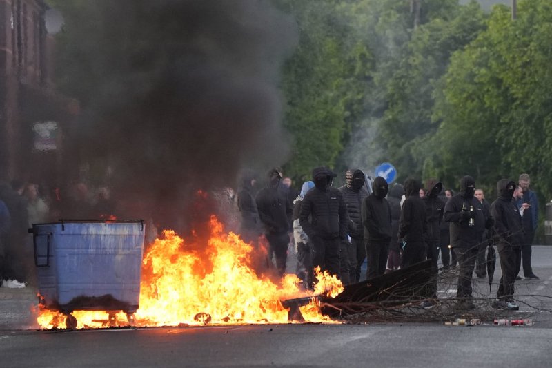 UK to tighten immigration checks along Irish border after Belfast unrest