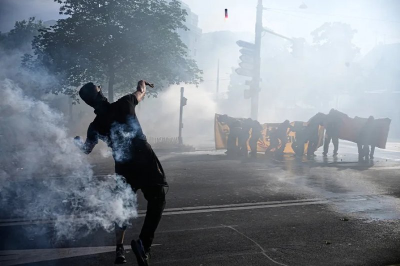 Protests erupt with police clashes at G7 summit start