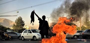 What is behind Iran's executions? What were the two men accused of?