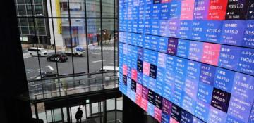 Asian stocks edge higher amid AI optimism