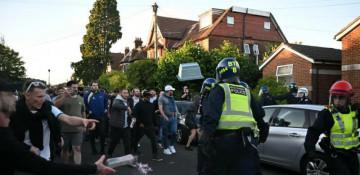 Protests turn violent in UK over student murder footage -  VIDEO 