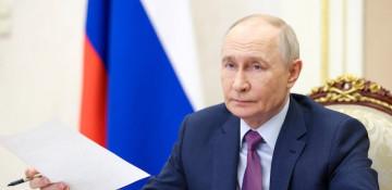 Putin faces rival visions of war and peace at Russia's 'Davos' 