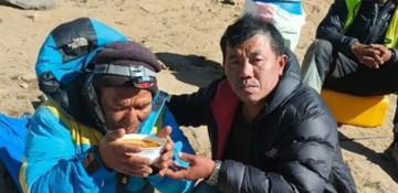 Everest guide found alive after six days missing on mountain