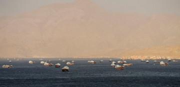 Iran warns: Hormuz strait will be open but ...