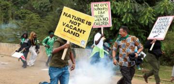 Kenya police fire tear gas, arrest ex chief justice at national park protest 