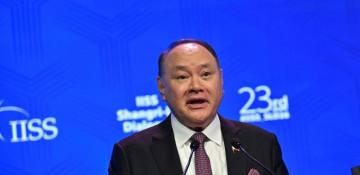 China targets Philippine defense chief and family with sanctions