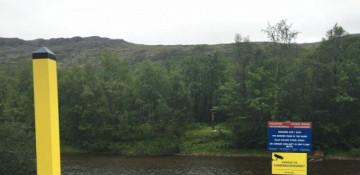 Why were Swedes fined for throwing stones into Russia?