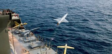 US claims downing of Iranian drones targeting commercial shipping in Strait of Hormuz