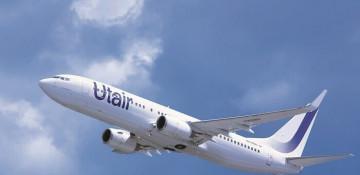 Panic on flight to Nakhchivan: Woman tries to open aircraft door