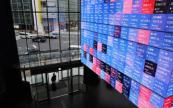 Asian stocks edge higher amid AI optimism