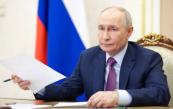 Putin faces rival visions of war and peace at Russia's 'Davos' 