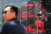 Asian stocks fall as oil prices rise following US strikes on Iran