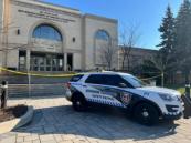 Officer dead, suspect linked to consulate shooting flees in Canada