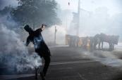Protests erupt with police clashes at G7 summit start