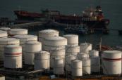 Major investment banks lower oil price forecasts