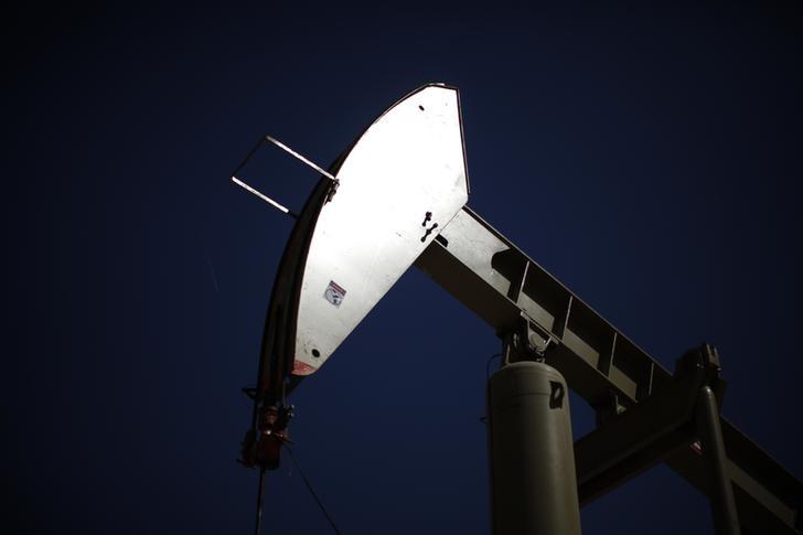 Oil prices edge up on record China crude imports, Saudi output cut