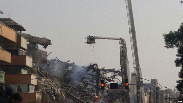 At least 30 dead after building collapses following devastating fire in Tehran