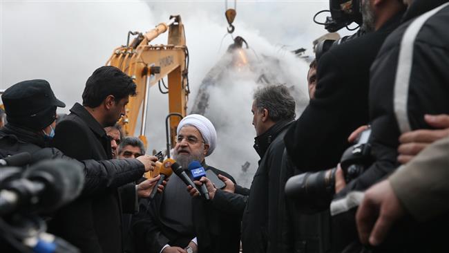 President Rouhani visits site of collapsed high-rise in downtown Tehran
