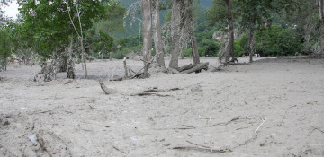 Two dead, tens of thousands stranded by Australia floods