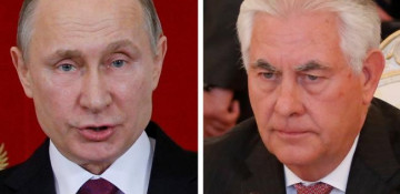 Putin says trust erodes under Trump, Moscow icily receives Tillerson
