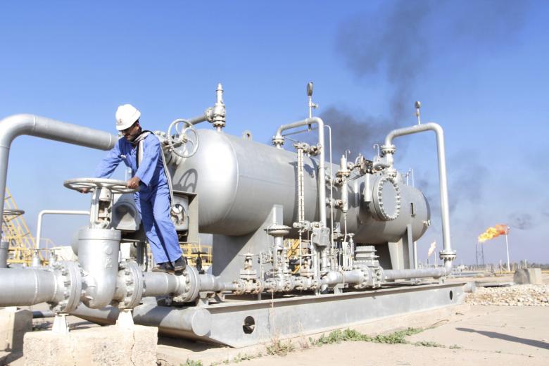 Oil little changed amid rising U.S. output, OPEC production cuts