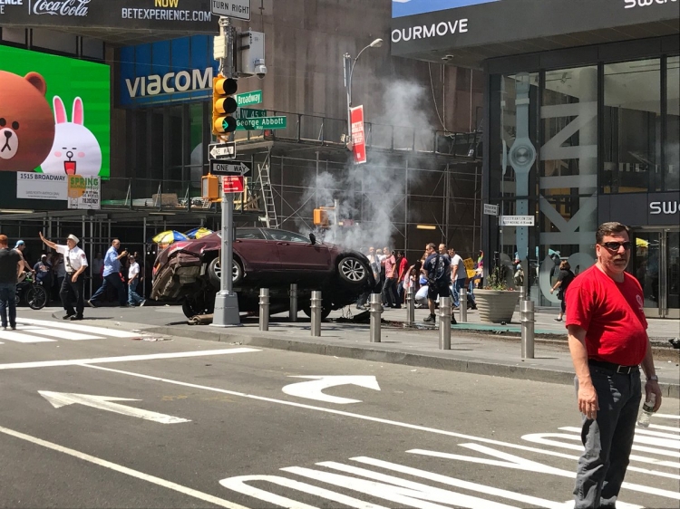 One person dead, at least 13 injured after car hits pedestrians in the U.S.