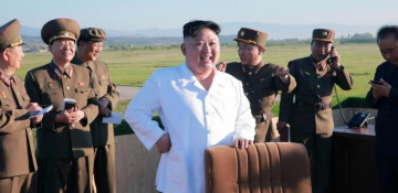 North Korea fires missile into sea off east coast in unusual night test