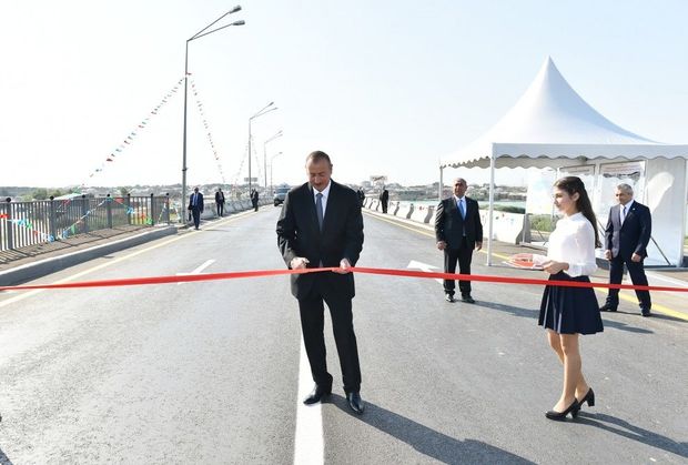 President attends opening of new roads - PHOTOS