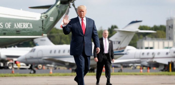 Trump returns to Washington with target on China