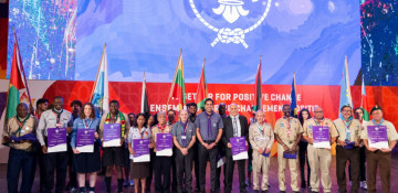 Nine new WOSM members get their certificates and flags