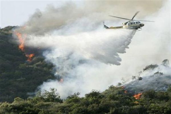 Helicopter involved in extinguishing forest fire in Azerbaijan