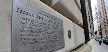 Fed keeps rates steady, approves portfolio cuts in October