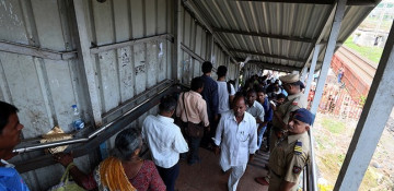 At least 22 dead, 32 injured in stampede on Indian pedestrian bridge