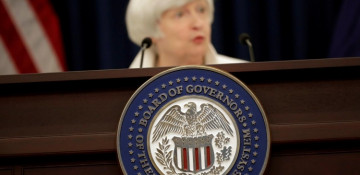 Fed leaves rates unchanged