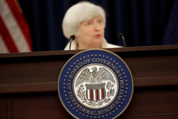 Fed leaves rates unchanged
