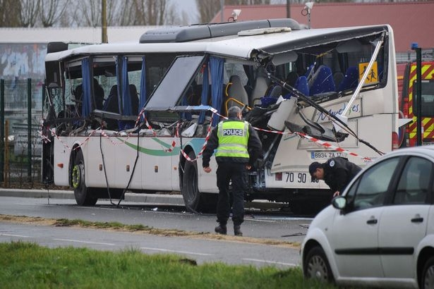 Children killed as school bus and train collide in France
