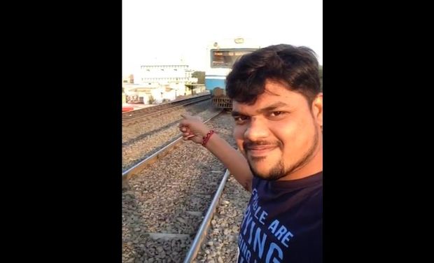 Man gets hit while recording selfie with approaching train - VIDEO