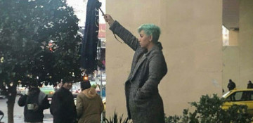 Iranian women take off headscarves to protest veil law